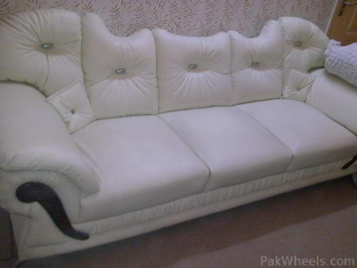 White deals rexine sofa