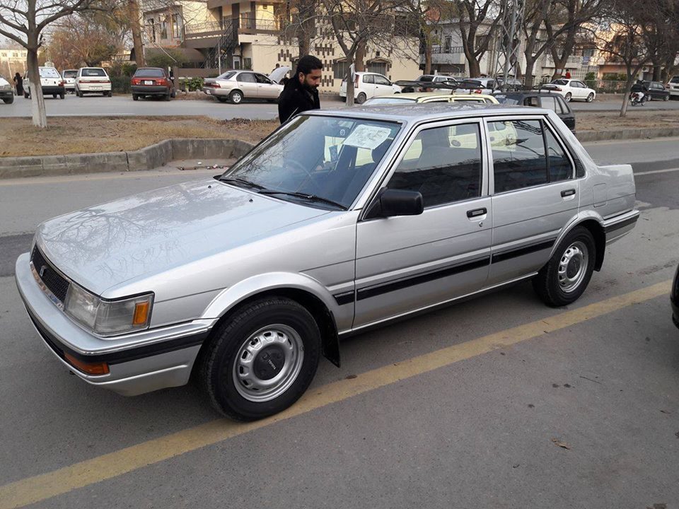 Отель 1983 1988. Toyota Corolla 1986. Тойота Королла 1986. Toyota Corolla e80 1986. Toyota Corolla XL 1986.