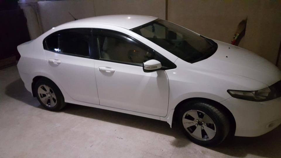 Exterior Colour Taffeta White Registration City Islamabad Mileage 66000KMS Overall Condition Total Genuine Bumper To Company Maintained