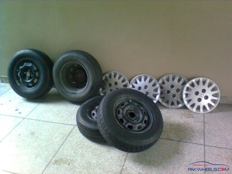 Honda City OEM tyres and rims 165 80 R13 Car Parts PakWheels